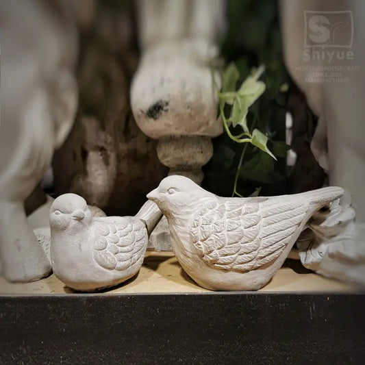 CEMENT BIRD CANDLE HOLDER